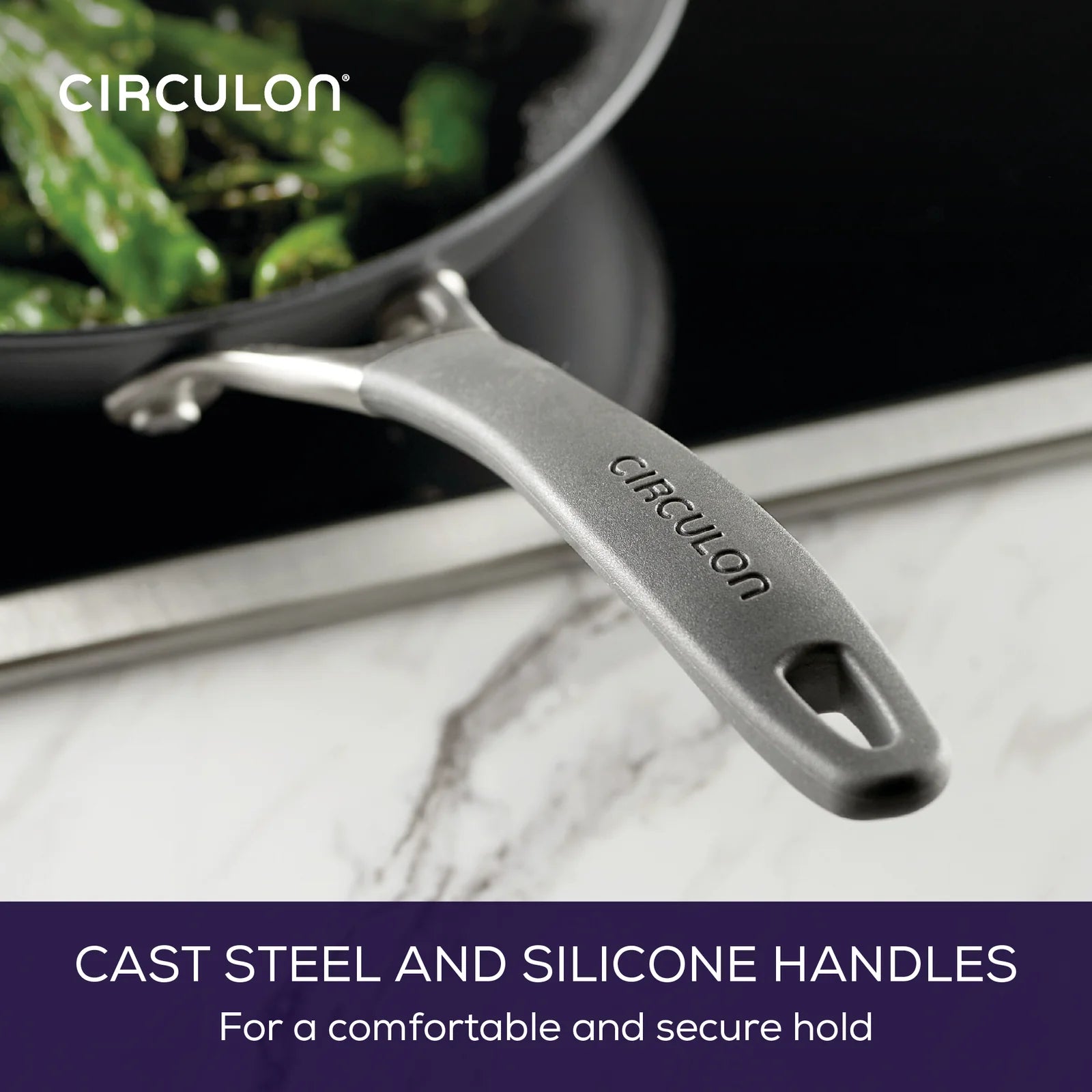 Circulon skillet with silicone handle on a marble surface