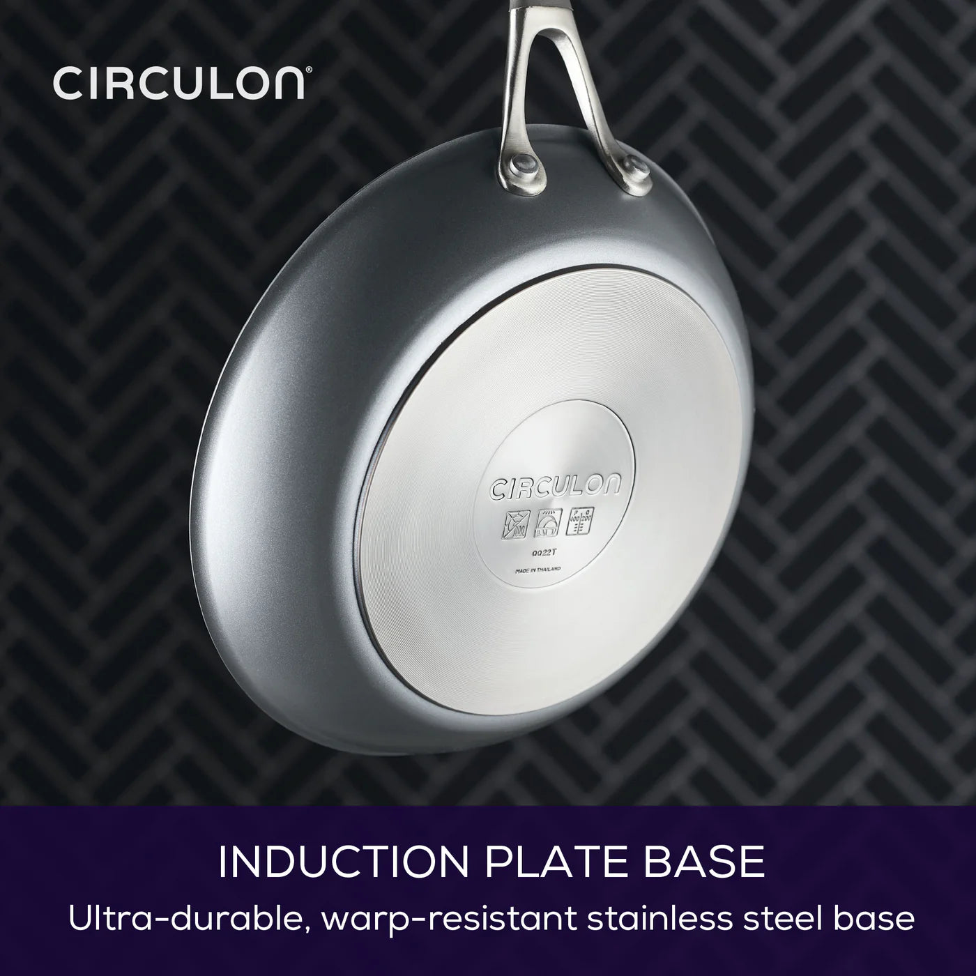 Circulon induction plate base with brand name on a dark background